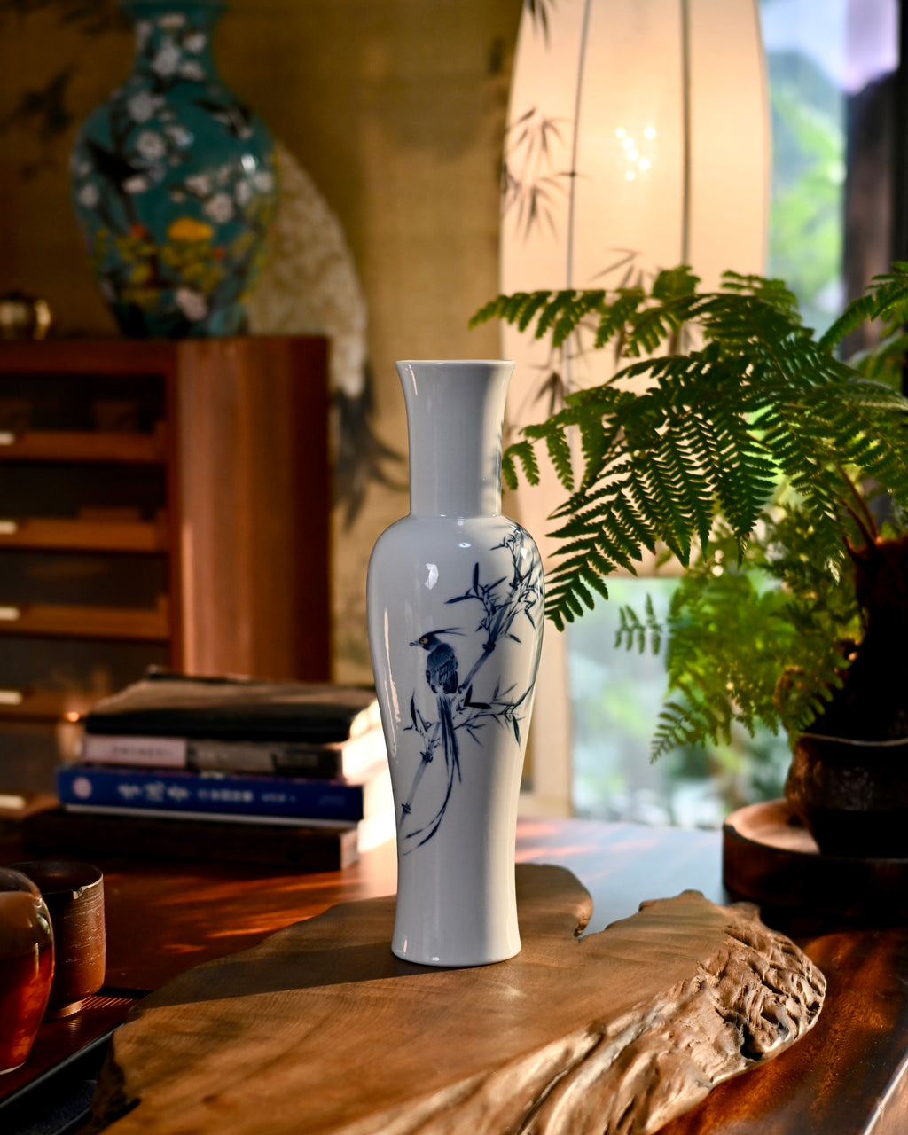 Glossy white porcelain base texture and cobalt blue floral brushwork detail
