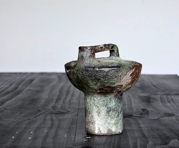 Aged design rustic surface ceramic vase with hollow handle, handcrafted rough pottery for wabi sabi home decor