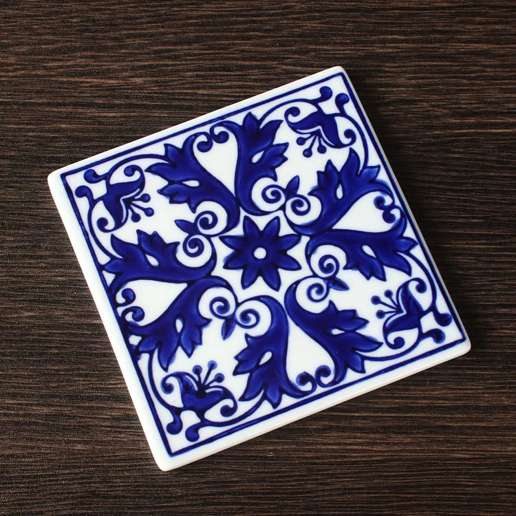Blue-and-white ceramic snack tray with hand-painted floral design and smooth glossy finish