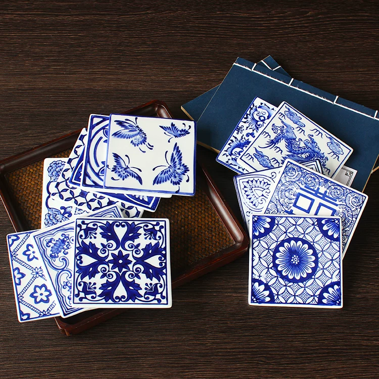 Blue-and-white porcelain square coaster with hand-painted cobalt floral motif and glossy glaze finish