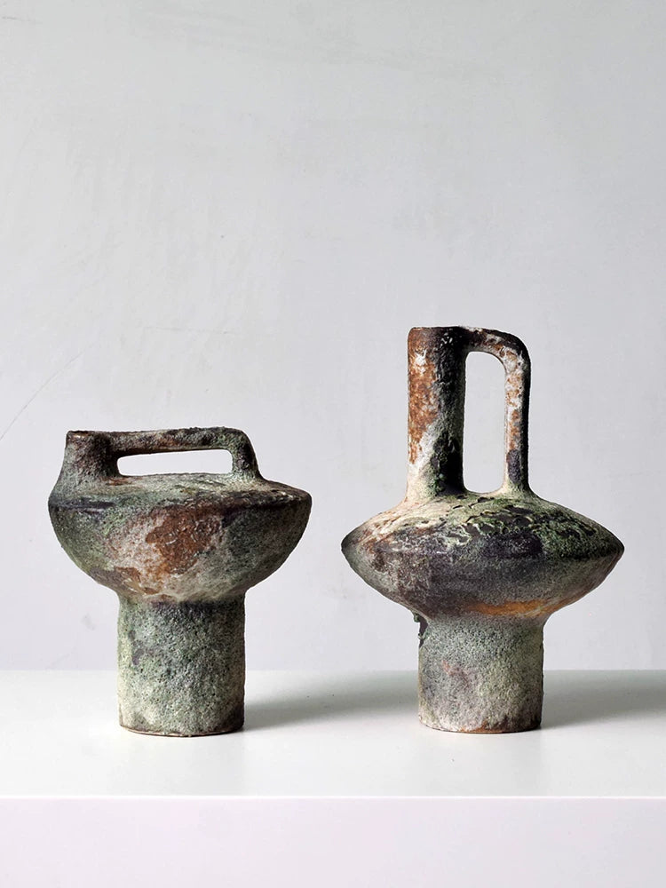 Decorative Japandi ceramic flower vase with hollow handle, handmade rough pottery for tabletop home decoration