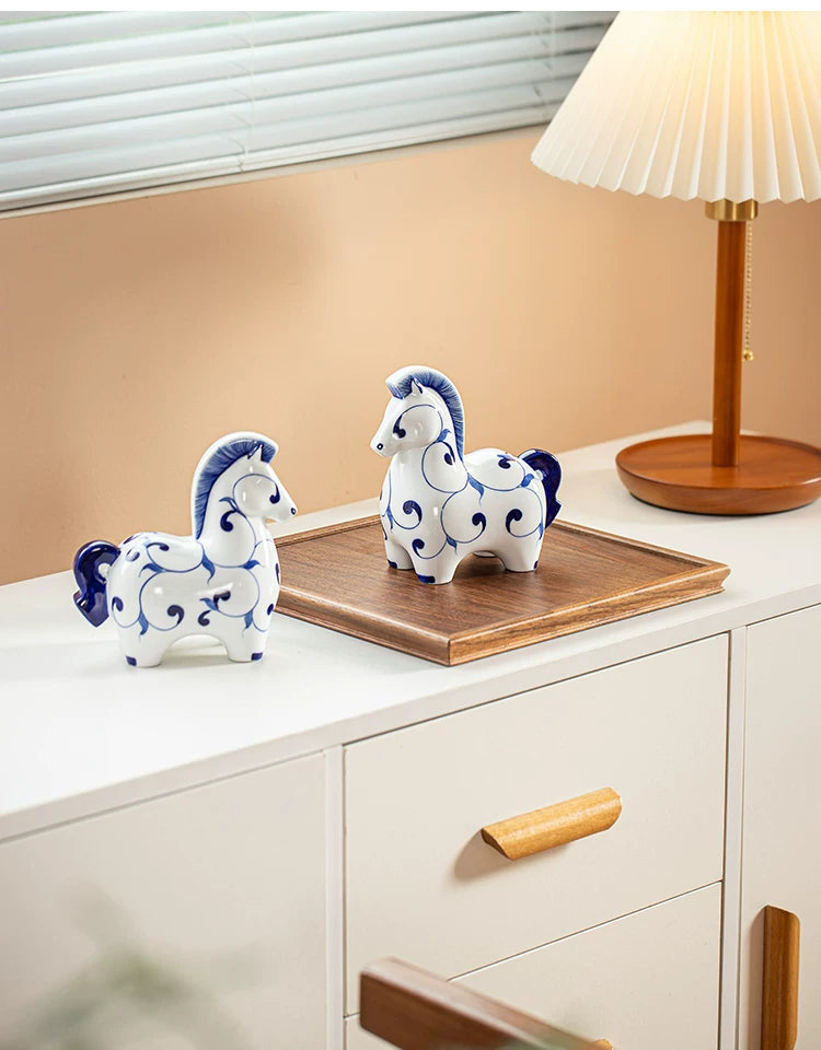 Underglaze blue ceramic horse ornament with hand-painted swirl patterns, delicate art piece for tea room and study table display