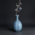 Handmade Jingdezhen antique blue glaze melon porcelain vase, Song dynasty minimalist style with resin branch and natural stone flower decor