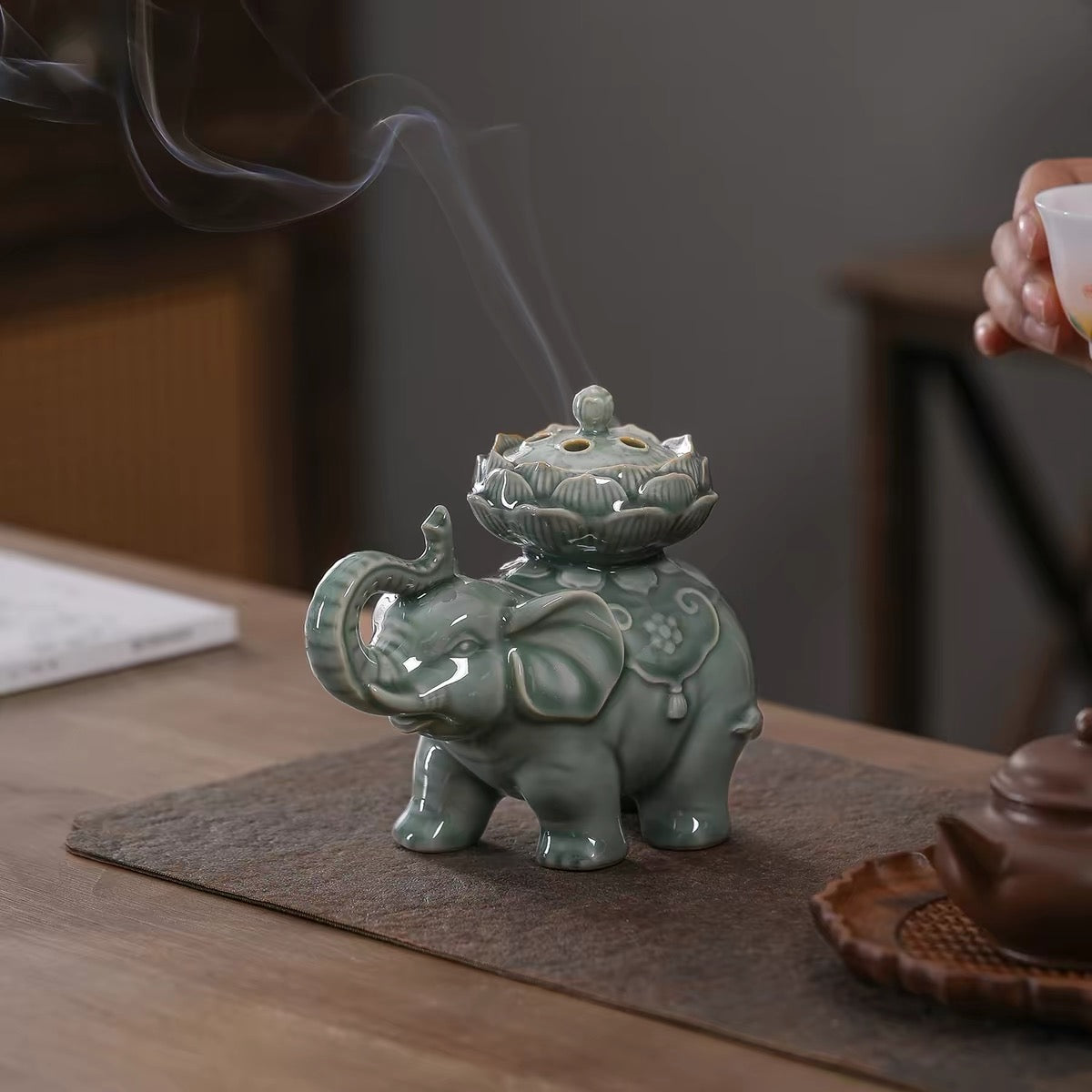 Glazed incense burner with elephant and lotus sculpture, classic oriental aesthetic, practical coil incense tool for tea ritual and home styling