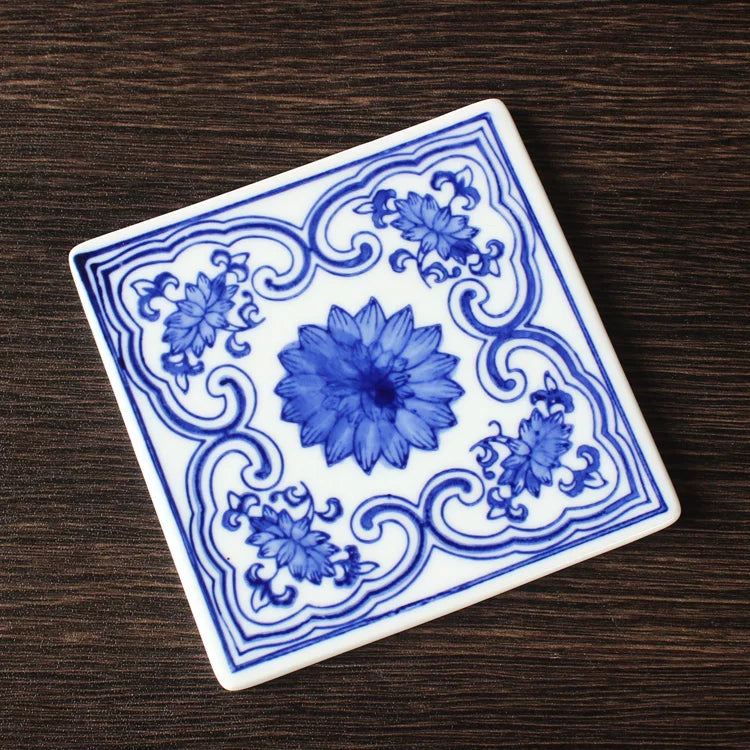 Peony vine blue-and-white tile with rich cobalt decoration and transparent overglaze