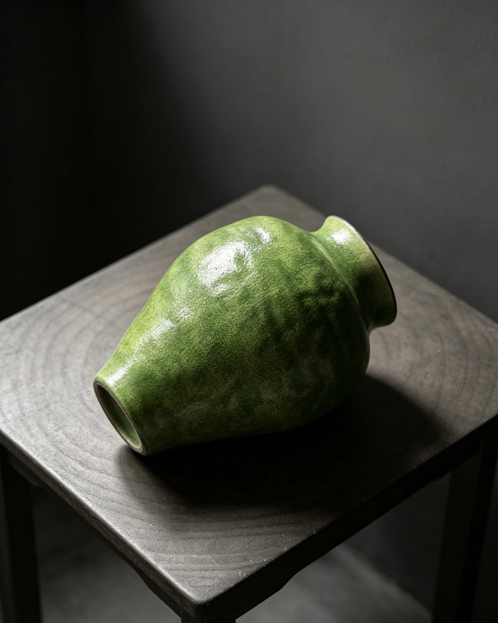 Plain silhouette stoneware ornament with mottled green glaze, hand crafted rustic ceramic vessel for shelf and table styling