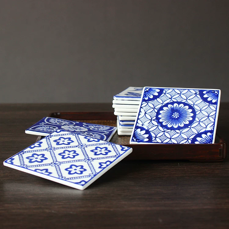 Porcelain drink mat 10cm square with hand-painted underglaze blue botanical pattern