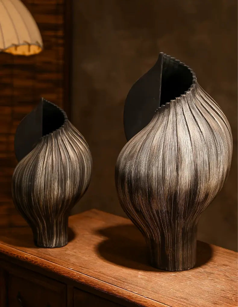 Sculptural ceramic vase used as an artistic accent for a modern entryway or console