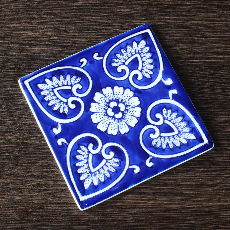 Square porcelain tea accessory suitable as cup mat snack tray or decorative accent