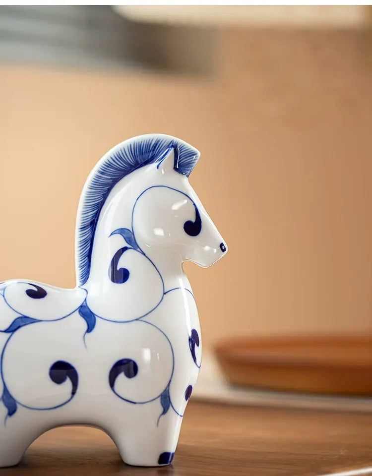 Decorative ceramic horse statue for study room, hand painted blue motifs, symbol of energy and success for home styling