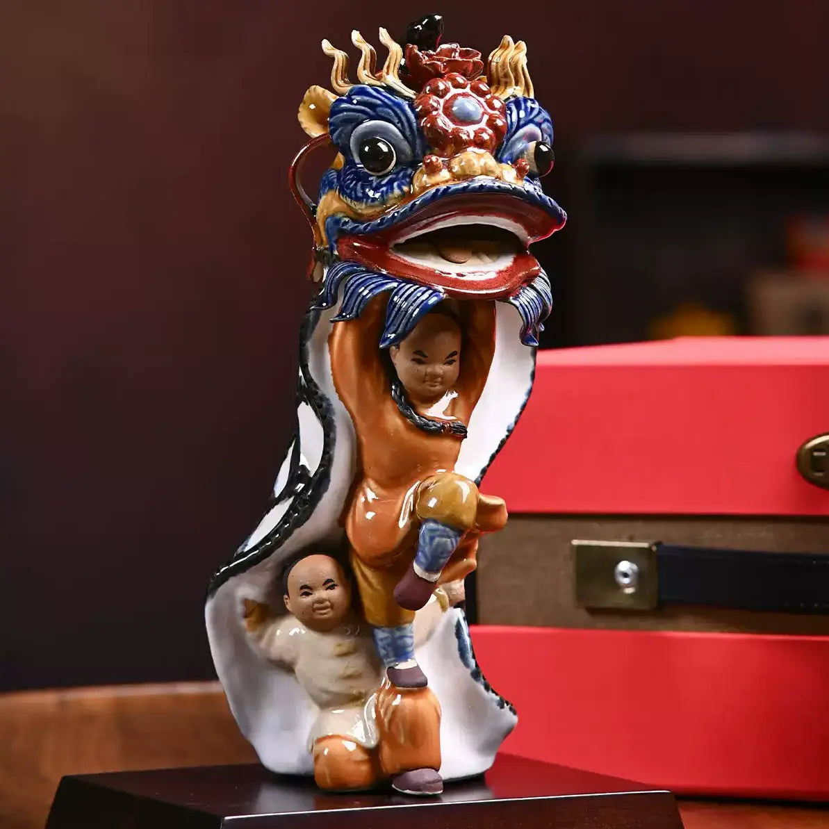Pair of Shiwan pottery waking lion figurines in tall and short sizes, Chinese intangible heritage folk ceramic table decor
