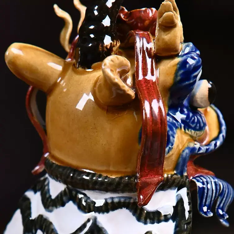 Close-up of handmade Shiwan waking lion sculpture, vivid glaze details, Wong Fei-hung inspired lion dance art